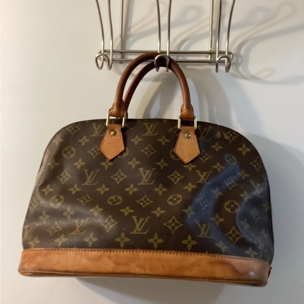Louis Vuitton Monogram Alma Handbag Brown Coated Canvas Leather